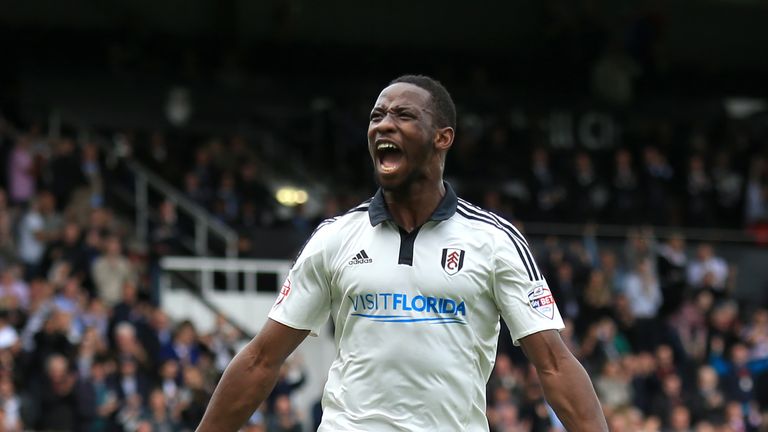 Moussa Dembele celebrates after scoring for Fulham last season