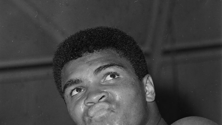 Ali poses for the camera during a 1966 training session