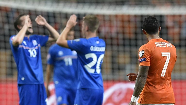 Netherland's Memphis Depay (R) reacts after losing  the UEFA Euro 2016 qualifying round football match between Netherlands and Iceland at the Arena Stadium