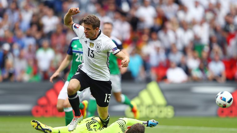 Michael McGovern denies Thomas Muller in the early stages