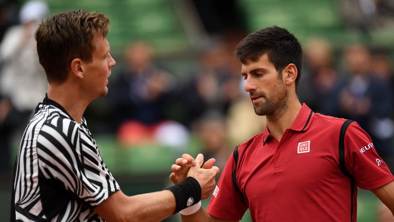PARIS, FRANCE - JUNE 02:  Novak Djokovic of Serbia shakes hands with Tomas Berdych of Czech Republic following his victory during the Men's Singles quarter