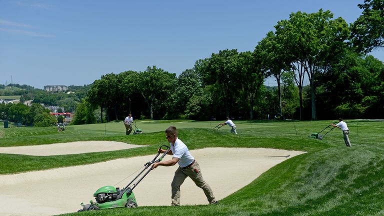 Crews prepare the 1st hole at the Oakmont Country Club golf course for the upcoming U.S. Open on Thursday, June 9, 2016.  