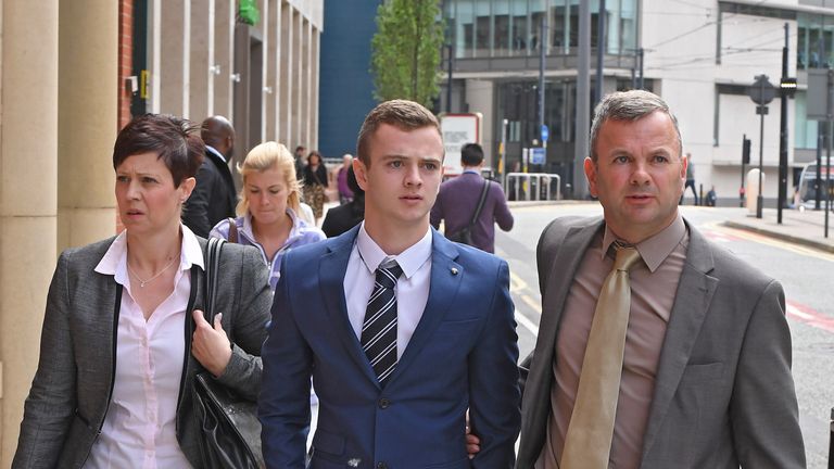 Oldham Athletic footballer Jack Tuohy, 19, with his father (right) outside Manchester Minshull Street Crown Court 