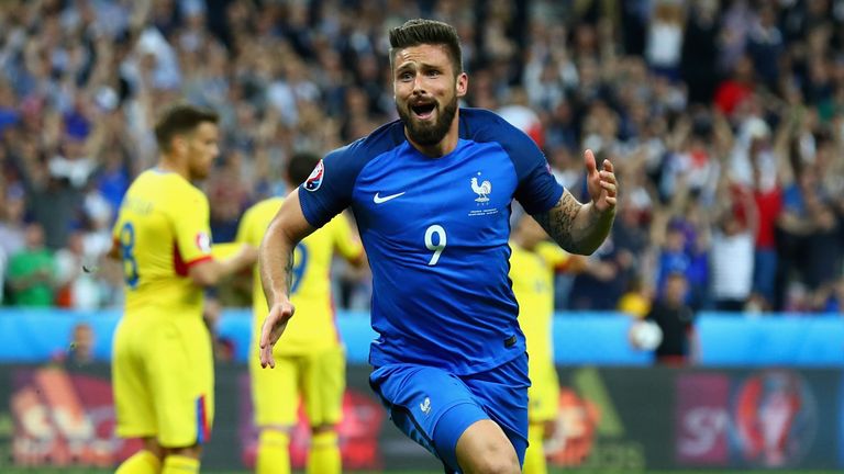 Olivier Giroud celebrates scoring France's opening goal against Romania