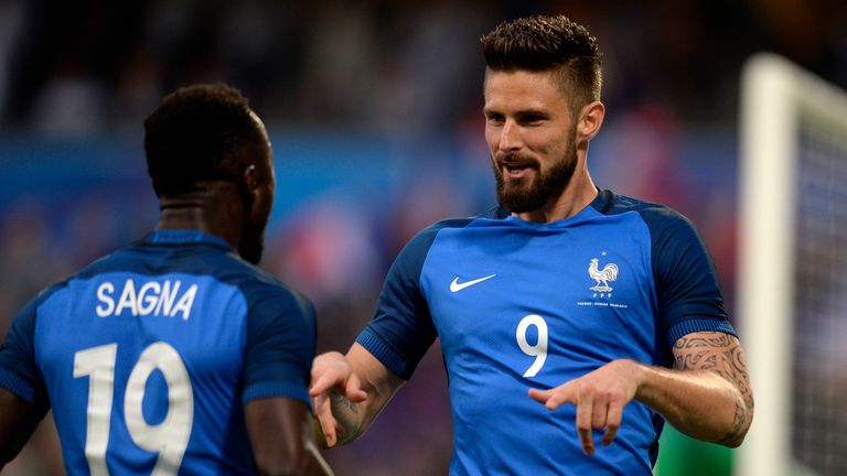 METZ, FRANCE - JUNE 04: Olivier Giroud of France (R) celebrates his team's first goal with Bacary Sagna of France during the International Friendly between
