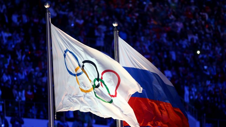 The Olympic flag and the Russian flag