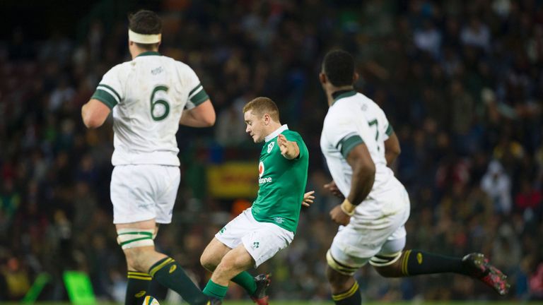 Paddy Jackson (C) from Ireland kicks a drop goal in their game against the Springboks at Newlands Stadium, on June 11, 2016