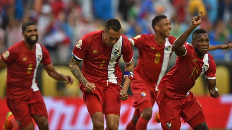 Panama's Blas Perez (c) celebrates after scoring