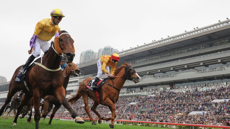HONG KONG - DECEMBER 13:  Joao Moreira riding Peniaphobia of Hong Kong defeats Christophe Soumillon riding Gold-Fun in Race 5, The Longines Hong Kong Sprin