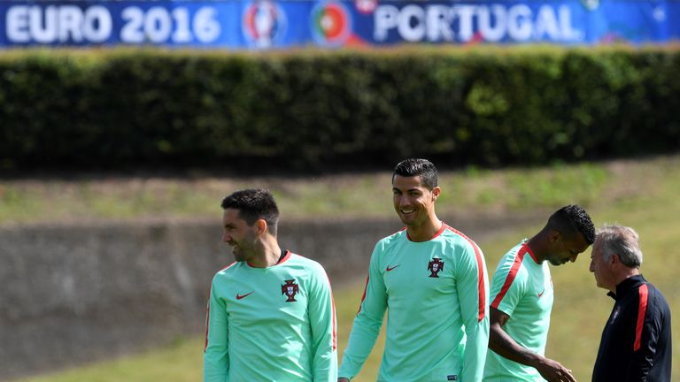 Portugal forward Cristiano Ronaldo (C) and team-mates take part in a Euro 2016 training session at the team's base camp in Marcoussis, outskirts of Paris