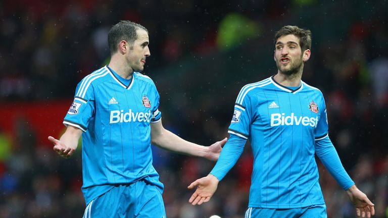 John O'Shea of Sunderland (L) talks with Danny Graham of Sunderland after the Barclays Premier League match between Man