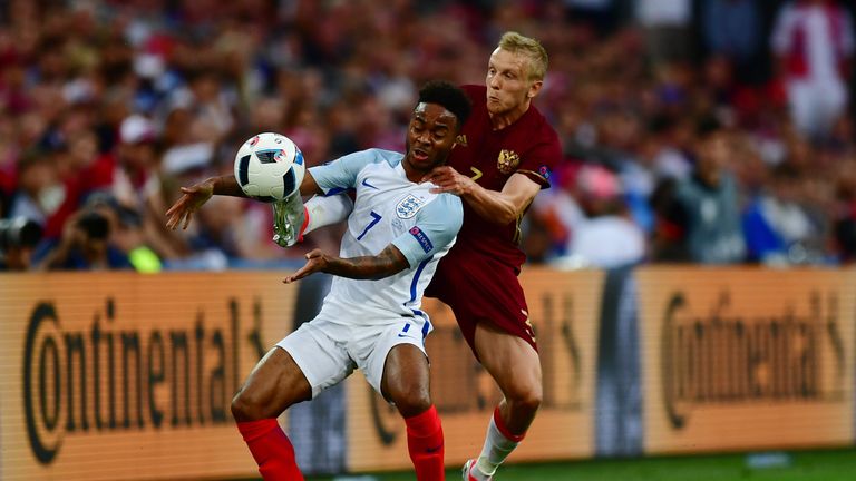 MARSEILLE, FRANCE - JUNE 11:  Raheem Sterling of England is challenged by Igor Smolnikov of Russia during the UEFA EURO 2016 Group B match between England 