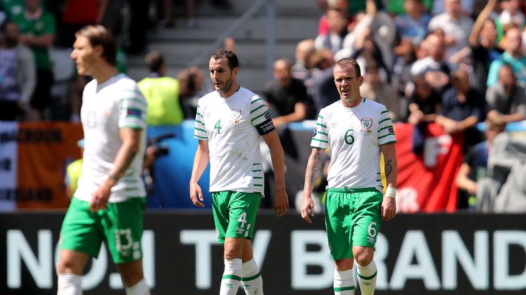 Republic of Ireland's John O'Shea and Glenn Whelan appear dejected
