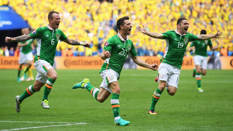 Glenn Whelan,  Wes Hoolahan and Robbie Brady celebrate against Sweden