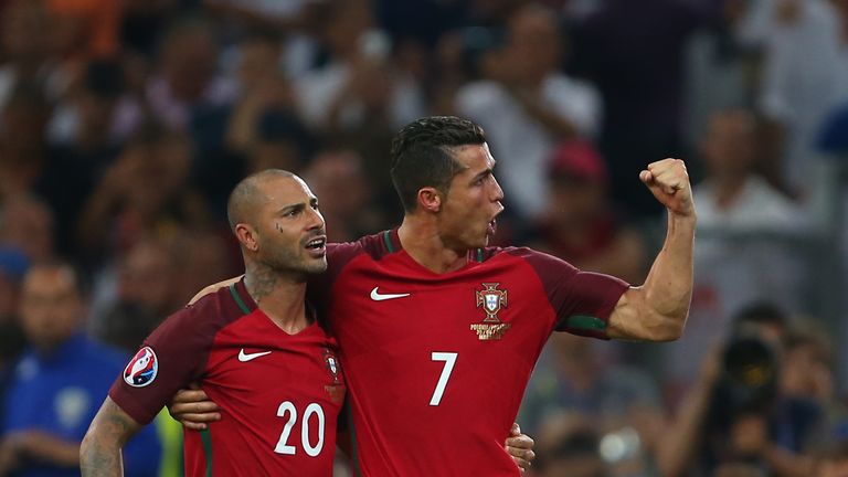 Ricardo Quaresma and Cristiano Ronaldo celebrate Portugal's penalty shoot-out victory over Poland