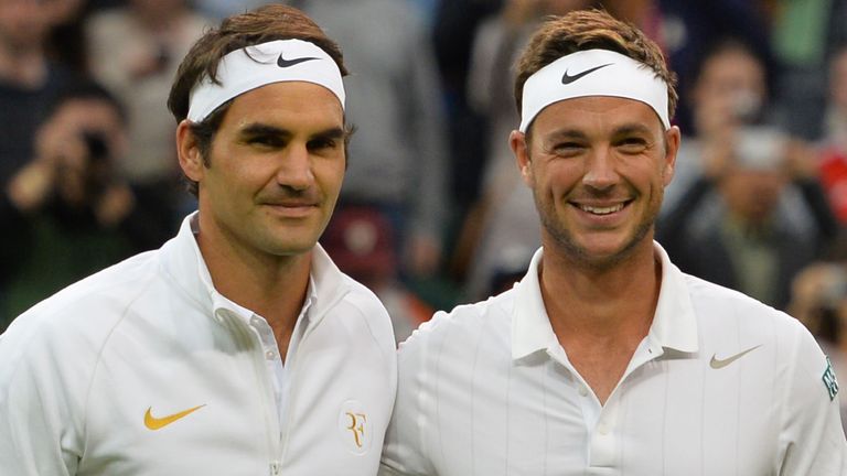 Britain's Marcus Willis (right) was up against Roger Federer on centre court