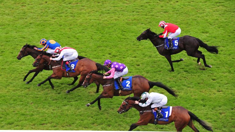 Roly Poly ridden by jockey Ryan Moore (left) wins the Grangecon Stud Stakes during day three of the Dubai Duty Free Irish Derby Festival at Curragh Racecou