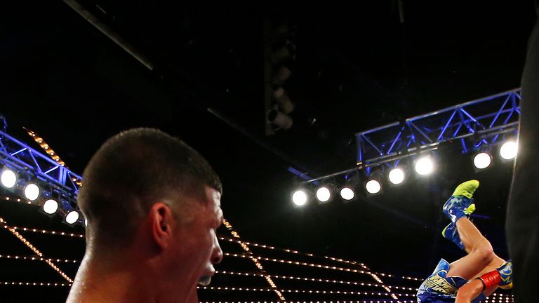 NEW YORK, NY - JUNE 11: Roman Martinez watches as Vasyl Lomachenko does a backflip