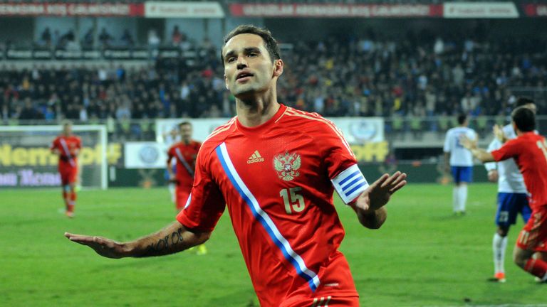 Russia's Roman Shirokov celebrates after scoring against Azerbaijan