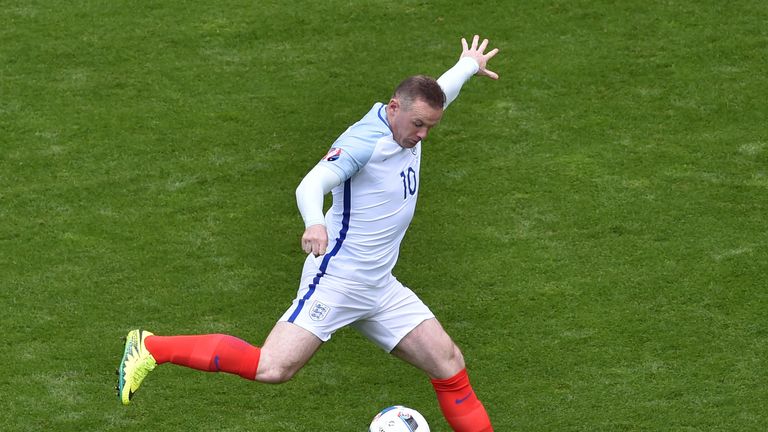 England's forward Wayne Rooney plays the ball during the Euro 2016 group B football match between England and Wales at the Bollaert-Delelis stadium in Lens