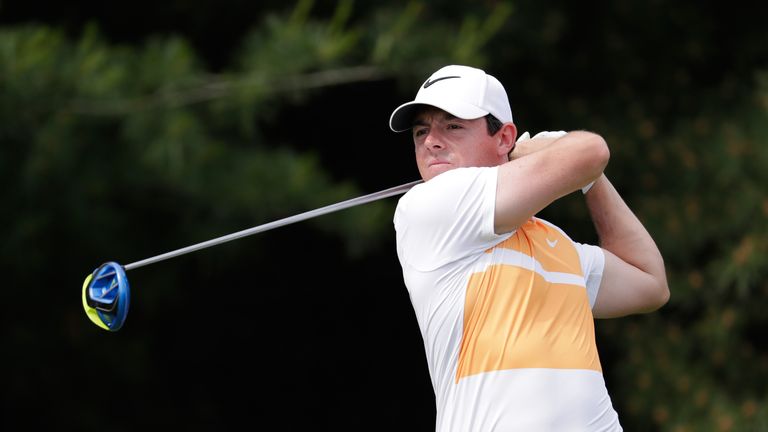 Rory McIlroy of Northern Ireland watches his tee shot on the 17th hole during the first round of The Memorial Tournament at Muirfield Village