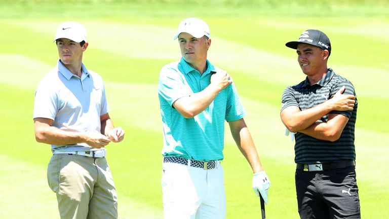 Rory McIlroy of Northern Ireland, Jordan Spieth of the United States and Rickie Fowler of the United States talk during a practice round at the US Open