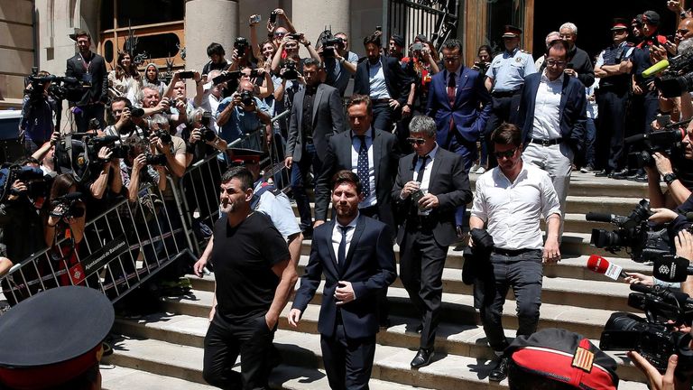 Barcelona's Argentine soccer player Lionel Messi leaves court where he is on trial for tax fraud in Barcelona