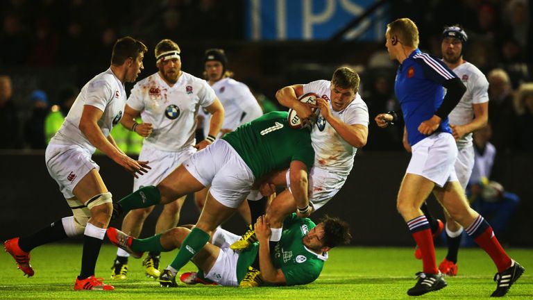 Jack Singleton is tackled by Andrew Porter of Ireland during the 2016 U20 Six Nations Championship