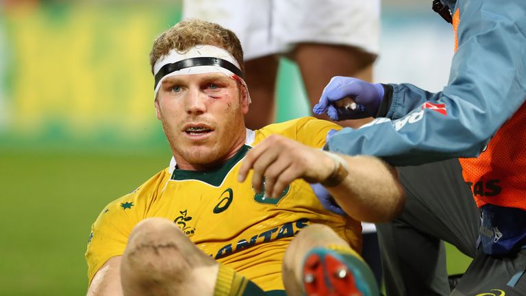 David Pocock of the Wallabies receives attention for an injured eye socket