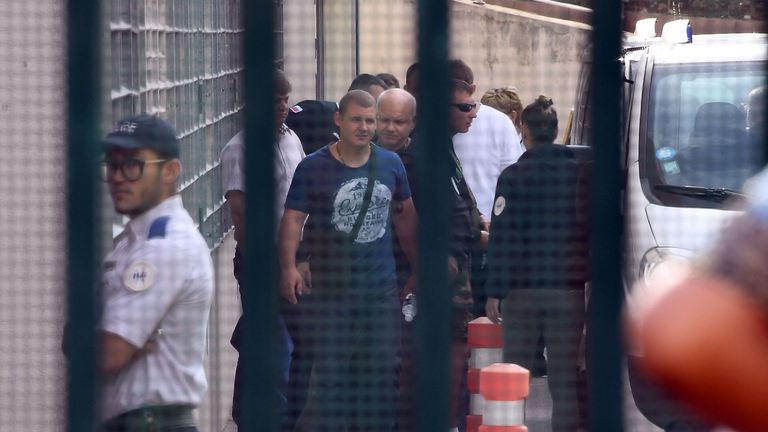 Russian fans leave the Marseille holding centre before being deported