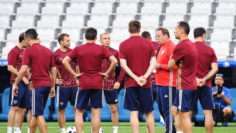 Russia coach Leonid Slutsky (3rd R) speaks to his players   during a training session at the Velodrome Stadium in Marseille, southeastern France