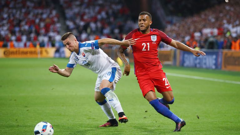 SAINT-ETIENNE, FRANCE - JUNE 20: Ryan Bertrand of England and Robert Mak of Slovakia compete for the ball during the UEFA EURO 2016 Group B match between S