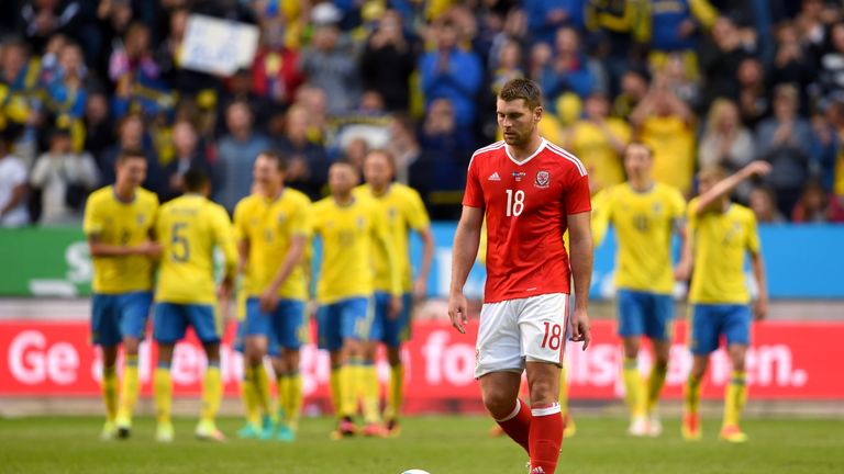 Wales' Sam Vokes appears dejected after Sweden's first goal during the International Friendly match at the Friends Arena, Stockholm