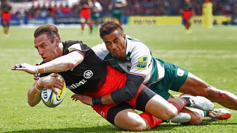 Chris Wyles of Saracens dives over the line to score a try during the Aviva Premiership semi final match between Saracens and Le