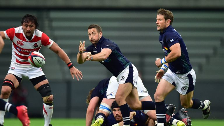 Scotland captain Greig Laidlaw passes the ball during the victory over Japan