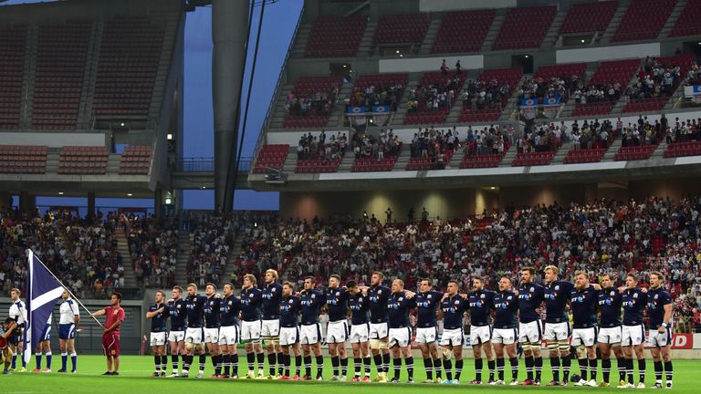 The Scotland players line-up for the national anthems ahead of their game against Japan