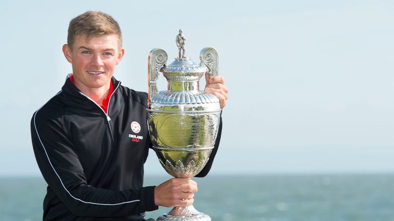 BRIDGEND, WALES - JUNE 18: Scott Gregory of Corhampton, winner of the Amateur Championship 2016, celebrates with the cup after beating opponent Robert MacI