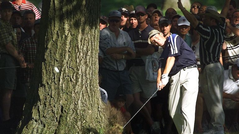 MEDINAH, UNITED STATES:  Sergio Garcia of Spain hits past a tree on the 16th fairway 15 August, 1999 during the final round of the 81st PGA Championship he