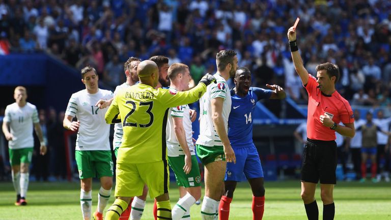 Republic of Ireland's Shane Duffy is shown a red card against France