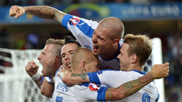 Slovakia's players celebrates their second goal 