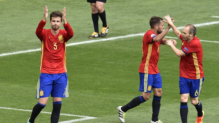 Gerard Pique celebrates his goal for Spain