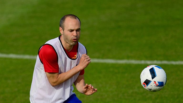 Spain's midfielder Andres Iniesta attends a training session in Saint Martin de Re's stadium on June 9, 2016, on the eve of the start of the Euro 2016 foot