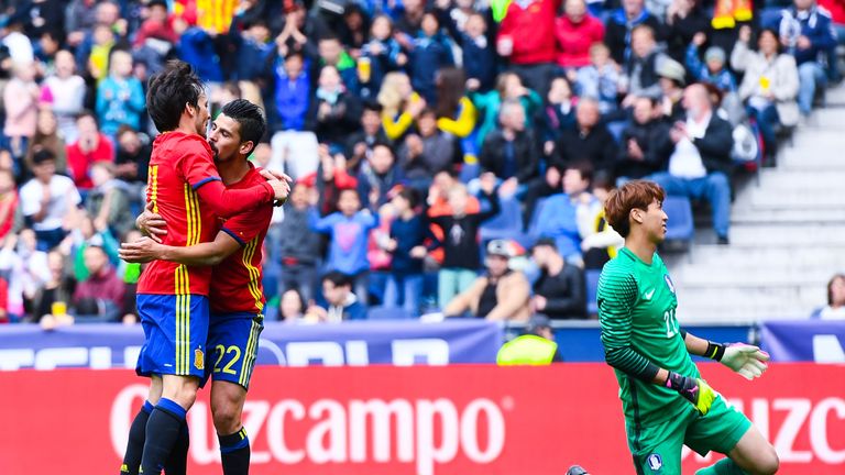 SALZBURG, AUSTRIA - JUNE 01:  Spain's Nolito celebrates with his team-mate David Silva after scoring his team's third goal against South Korea