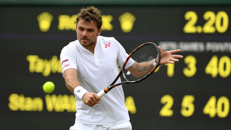 LONDON, ENGLAND - JUNE 28:  Stan Wawrinka of Switzerland lplays a backhand during the Men's Singles first round match against Taylor Fritz of The United St