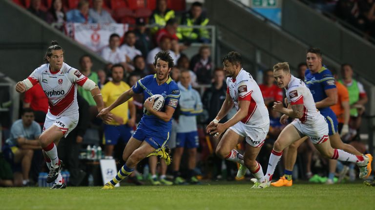 St Helens v Warrington Wolves - Langtree Park, St Helens, England - Warrington Wolves' Stefan Ratchford runs through the Saints defence