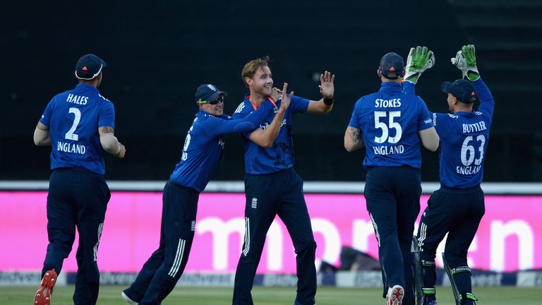 Stuart Broad of England celebrates with teammates after dismissing Hashim Amla of South Africa during the 4th ODI