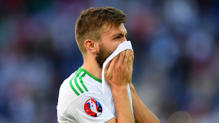 Stuart Dallas of Northern Ireland shows his dejection after his team's 1-0 defeat to Wales