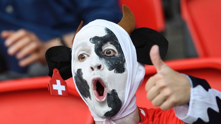 A Switzerland supporter reacts ahead the Euro 2016 group A football match between Romania and Switzerland at the Parc des Princes stadium in Paris
