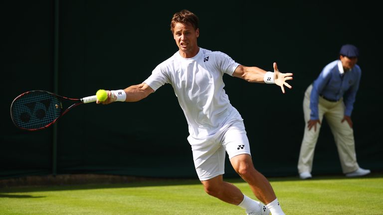 Ricardas Berankis of Lithuania plays a forehand shot during the Men's Singles first round match against Marcus Willis