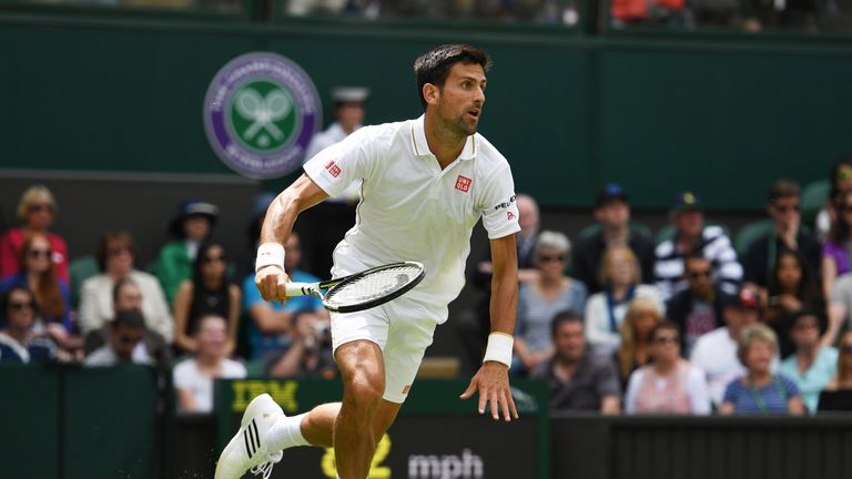 Novak Djokovic sprints to the net during the Men's Singles first round match against James Ward